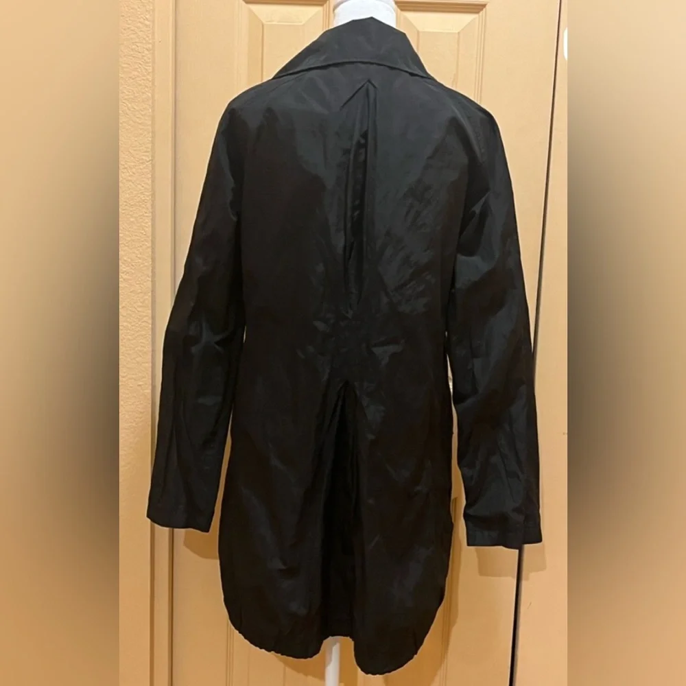 Chico’s raincoat/ long windbreaker/ trench coat. Black w/ silver tone buttons. M